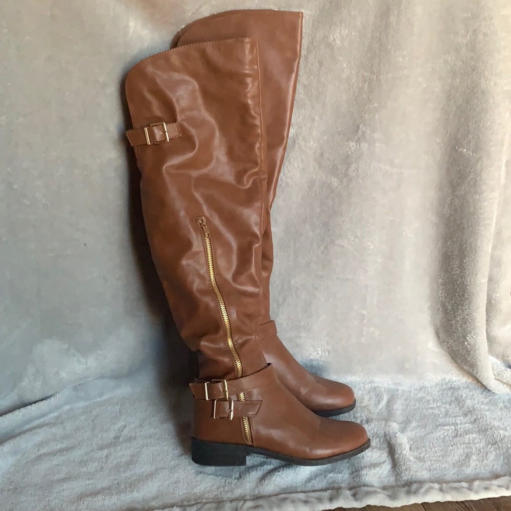 Thigh high brown boots